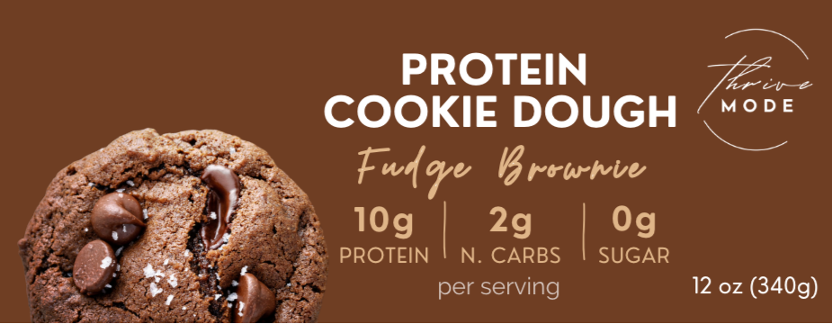 Protein cookie dough package with a brown background, showing a close-up of the cookie and nutritional information.