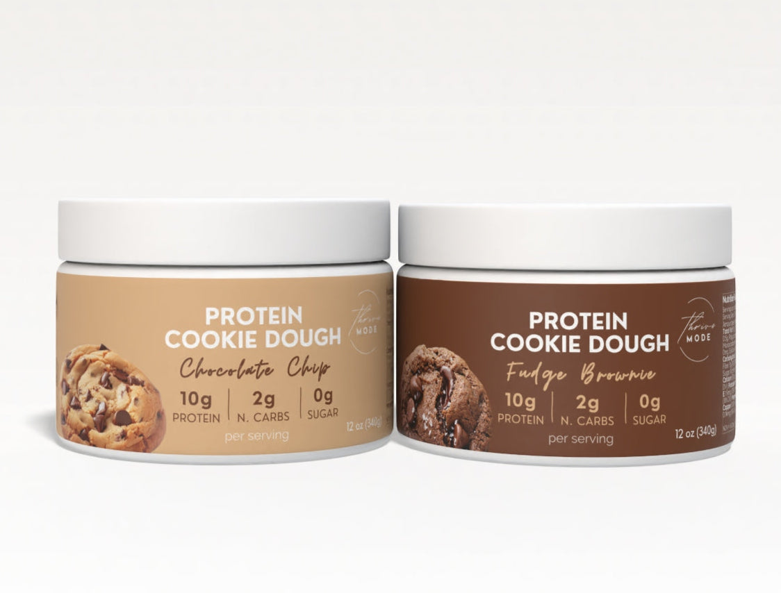Two containers of Protein Cookie Dough on a white background
