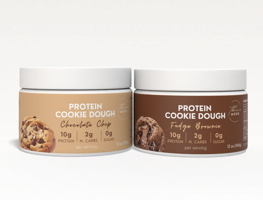 Two containers of Protein Cookie Dough on a white background
