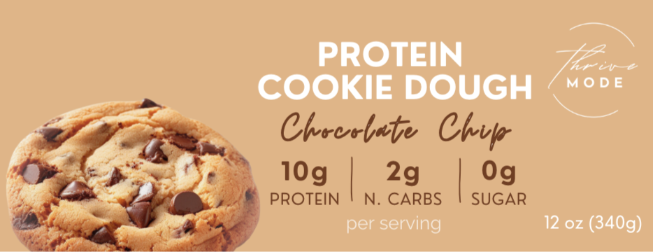 Protein cookie dough packaging with a cookie image and nutritional information on a beige background.